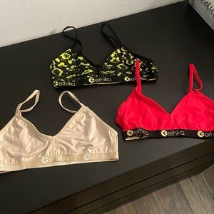 Set of 3 Ethika bralettes.